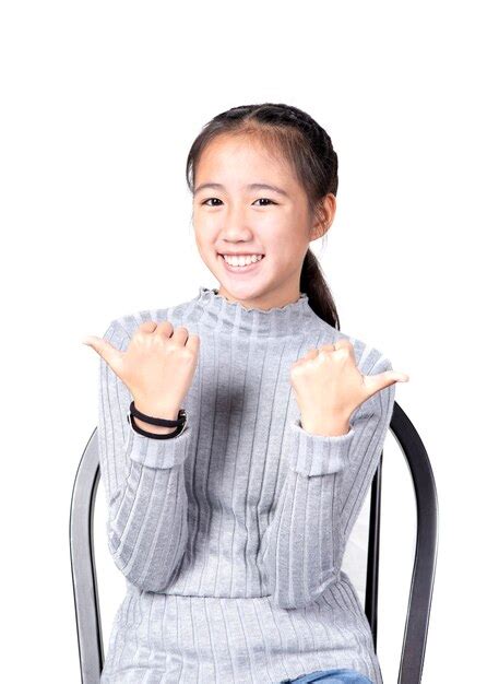 premium photo portrait of cheerful asian teenager toothy smiling face on white background