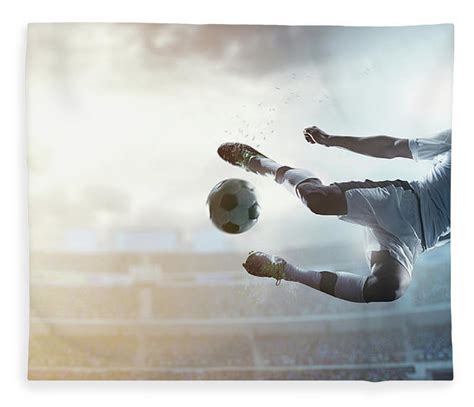 Soccer Player Kicking Ball In Stadium Fleece Blanket By Dmytro Aksonov