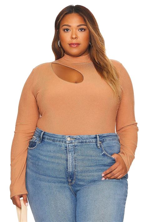 20 best plus size winter outfits in 2023 per stylists