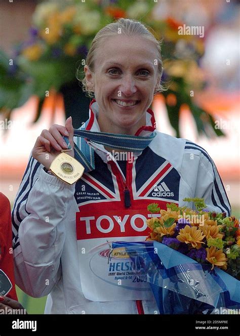 Great Britains Paula Radcliffe Shows Off Her Gold Medal For The
