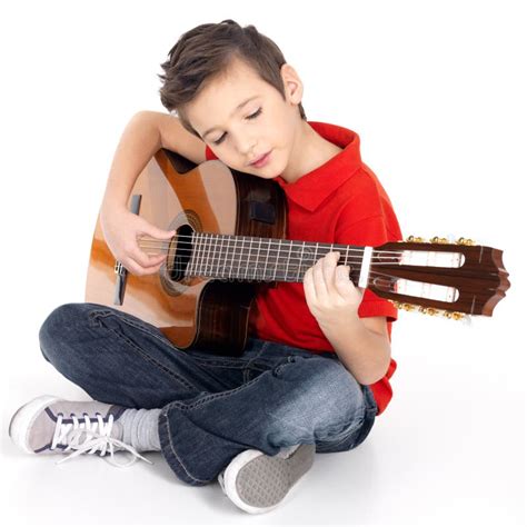 School Boy Is Playing The Acoustic Guitar Stock Photo Image Of Stage