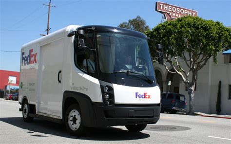 Unloading a fedex delivery vehicle in the snow. First Look: FedEx Express All-Electric Delivery Truck | Electric Vehicle News