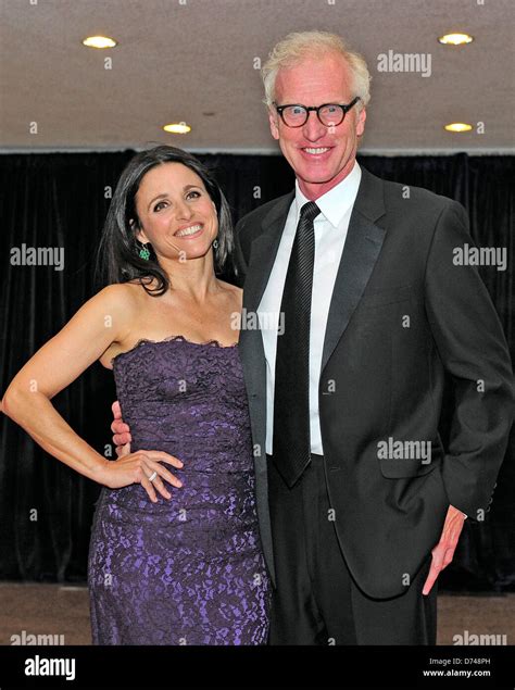 Julia Louis Dreyfus And Her Husband Brad Hall Arrive For The 2013