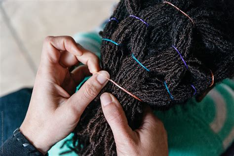 Hands Fixing The Hair Of An African American Girl Del Colaborador De Stocksy Gabi Bucataru