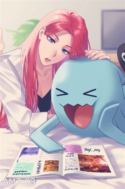 A Woman Laying In Bed Next To A Book With An Image Of Pokemon On It