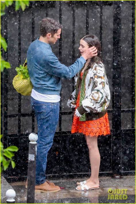 Lily Collins Gets Caught In The Rain With Lucas Bravo For Emily In