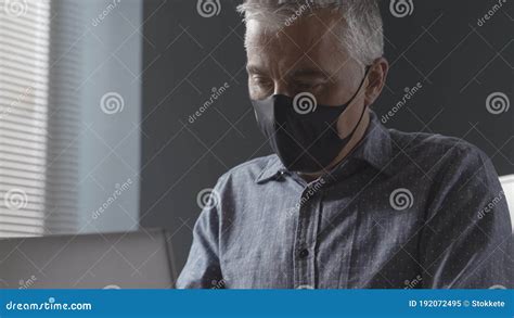 Businessman Wearing A Face Mask In The Office Stock Image Image Of