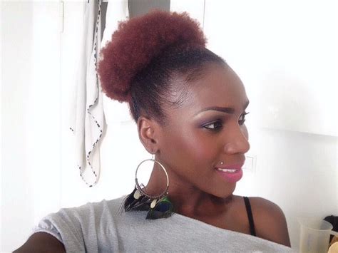 To style short natural hair so the curls look neat and organized, go with an undercut that has shaved designs on the sides, and add in a glint of red highlights on the ends of the curls for a brighter look. Hair Up-do: Afro puff on short/medium natural4C hair - YouTube