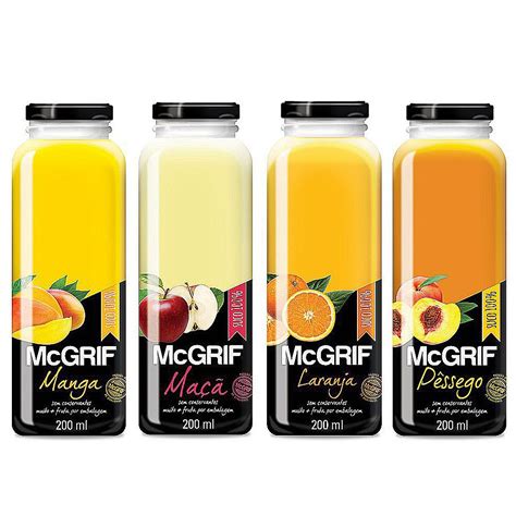 Three Bottles Of Juice With Oranges And Apples On The Top One Is