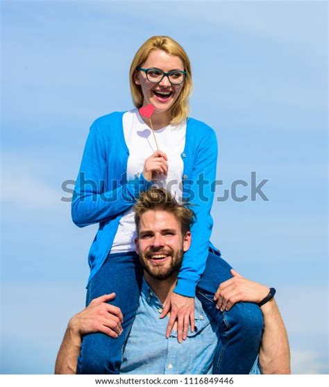 Man Carries Girlfriend On Shoulders Sky Stock Photo 1116849446