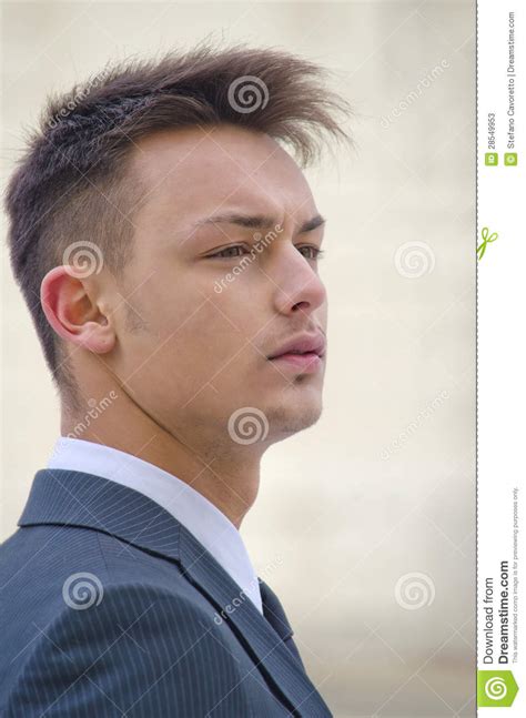 Profile Portrait Of Young Businessman In Suit Stock Image