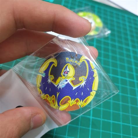 Jual Mudah Pokemon Coin Tazos Chiki Balls Lunala Terbatas Shopee