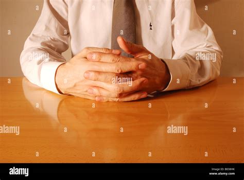 Hand Gestures Explaining With Interlaced Fingers Stock Photo Alamy