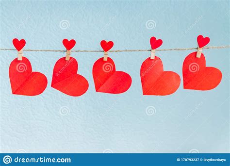 Love Hearts Hanging On Rope On A Blue Background Stock Image Image Of