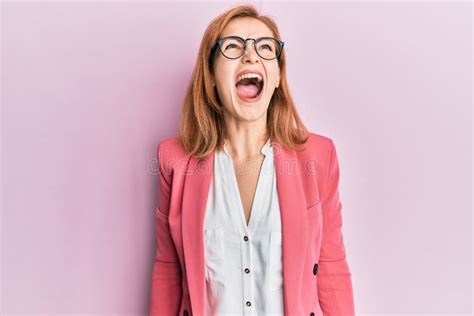 Young Caucasian Woman Wearing Business Style And Glasses Angry And Mad
