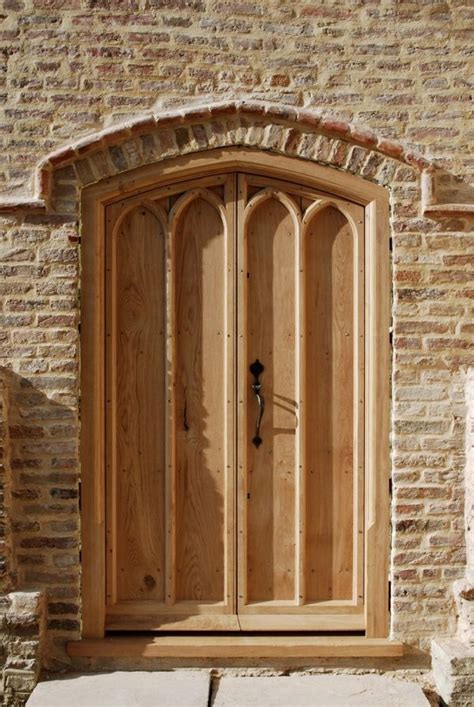 A Pair Of Solid Oak Boarded Exterior Doors And Frame With Hand Made
