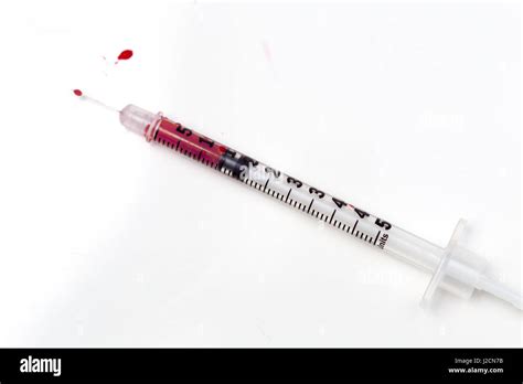 Blood Filled Syringe On White Background Stock Photo Alamy