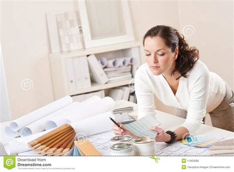 Young Female Interior Designer Working At Office Royalty Free Stock