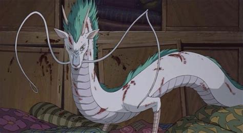 A White Dragon Standing On Top Of A Bed