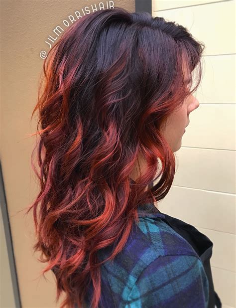 fiery red fall hair balayage highlights violet red and copper curls and waves fall hair