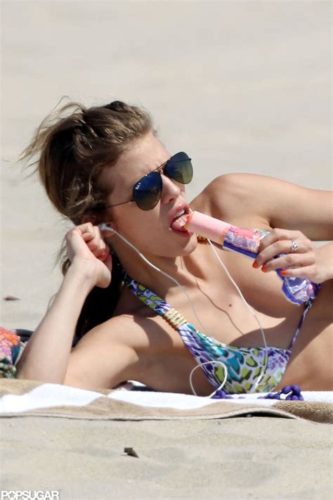 AnnaLynne McCord Eating Popsicle On The Beach In A Bikini Pictures