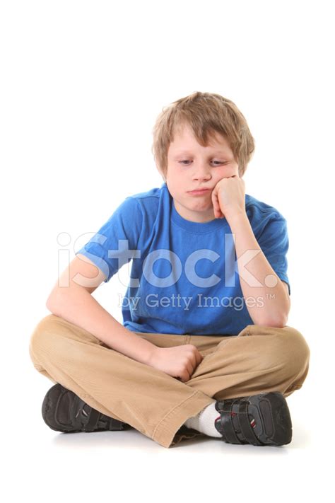Bored Boy Sitting Stock Photo Royalty Free Freeimages