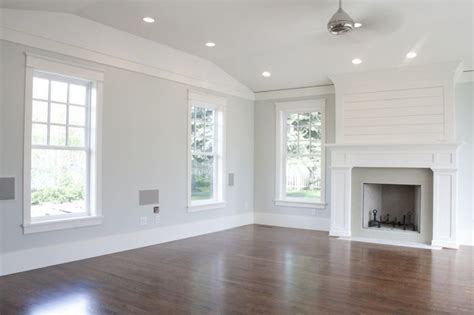 Light Gray Walls With White Trim And Dark Wood Floors Living Room Wood