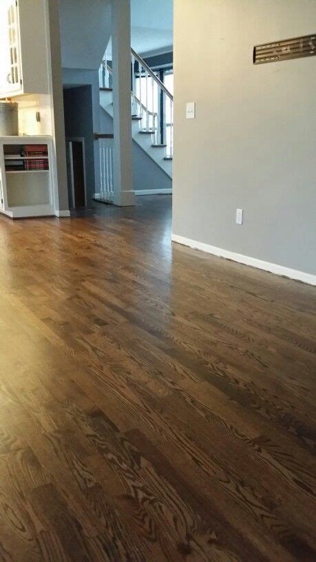 Buffing on dark walnut minwax stain on alcohol and water pop grain floor red oak 2 and 1/4 hardwood flooring. Minwax dark walnut duraseal with satin poly..on red oak ...