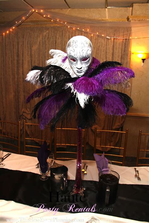 silver and purple masquerade eiffel sweet 16 feather centerpieces sweet 16 masquerade party
