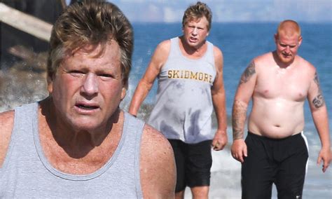Ryan O Neal Bonds With Son Redmond On The Beach As They Toss Frisbee And Pick Up Litter Daily