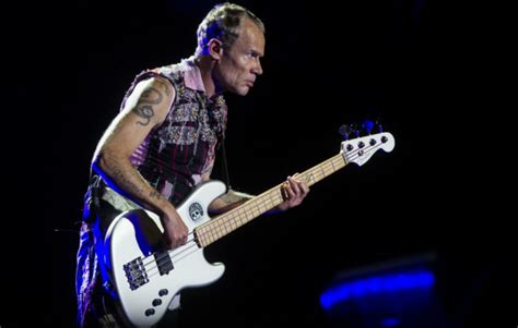 Red Hot Chili Peppers Flea Entertains Crowd With Handstands As Bands