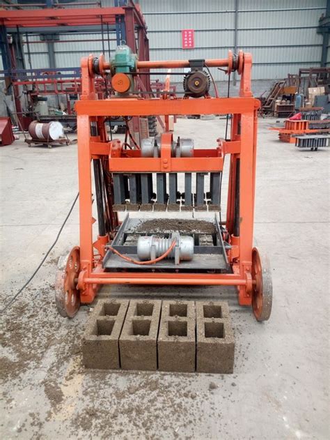 moving concrete block laying machine,cement sand blocks production