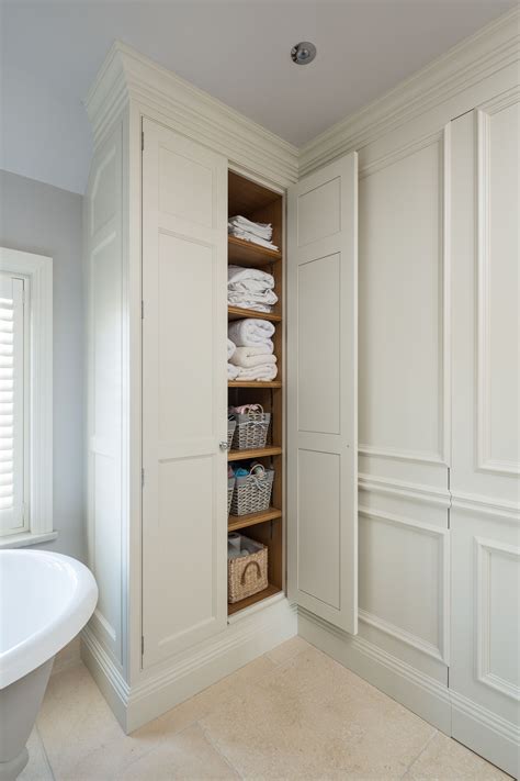 The shelves may be adjustable and sometimes the basic design allows for flexible uses, and people may use a linen cupboard to store a variety of things. Bespoke linen cupboard with traditional wall panelling ...