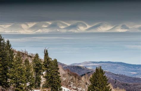 Kelvin Helmholtz Wave Clouds Engulf The Sky Of Snowbasin Utah