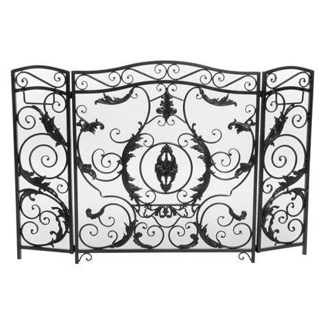 An Iron Fireplace Screen With Ornate Designs On The Top And Bottom