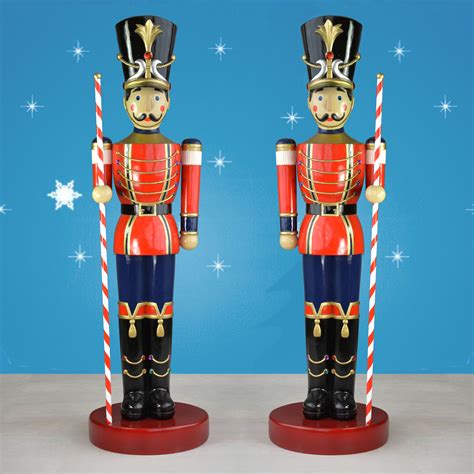 65 Ft Pair Of Toy Soldiers With Striped Batons