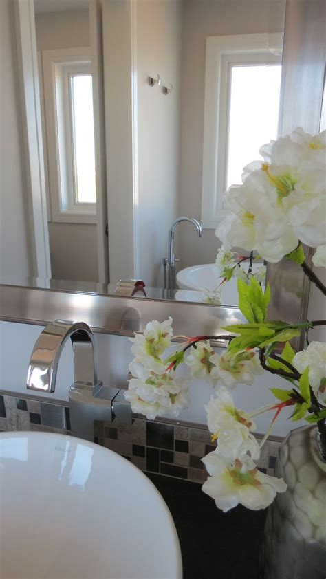 Even Artificial Flowers In A Beautiful Vase Make A Bathroom Look Fresh