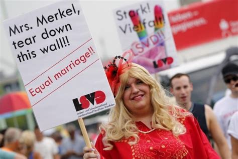 germany legalizes same sex marriage despite angela merkel s vote against it