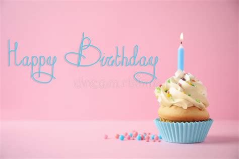 Happy Birthday Delicious Cupcake With Candle On Pink Background Stock