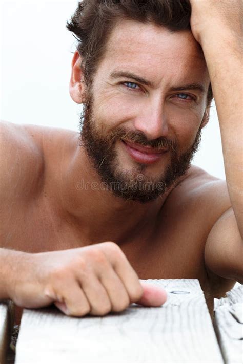Smiling Handsome Man With No Shirt Stock Photo Image Of Blue