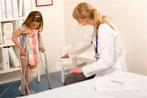 At The Pediatrician Little Girl With Crutches Stock Image Image Of