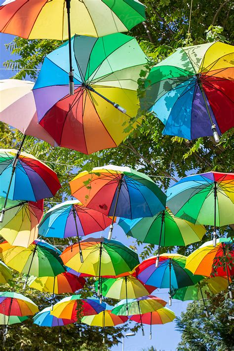 Colorful Umbrellas Hanging As Street Decorations By Stocksy