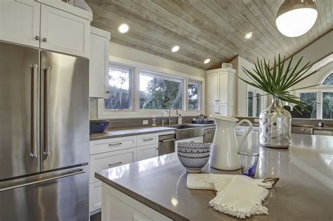 Kitchens, bedrooms, modern to cottage style. Grey washed tongue-and-groove ceiling, white shaker ...