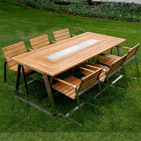 In addition to being inexpensive and its unattractiveness, teak furniture is water repellent and has no problem. 7 Pc Stainless steel Teak Modern Outdoor Table Set ...