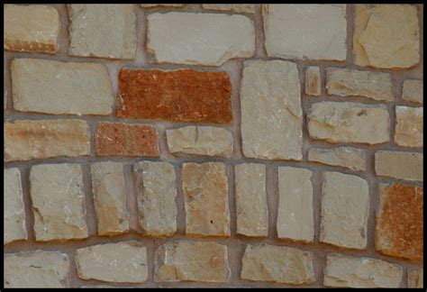 Texas Tan Stone With Caprock Buff Mortar At Exterior Elevation And