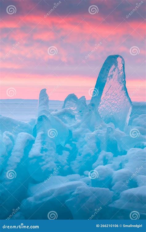 Blue Transparent Ice On Baikal Lake At Sunrise Pink Clouds And Blue