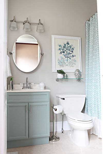 The gray leather veneer is actually (surprise!) removable, vinyl wallpaper. 13 Pretty Small-Bathroom Decorating Ideas You'll Want to ...