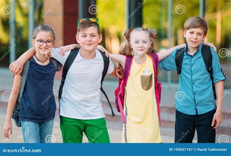 Children S Friendship Four Little School Students Two Boys And Two
