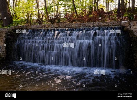 Beautiful Waterfall In The Park Long Exposure Waterfall Flows From A