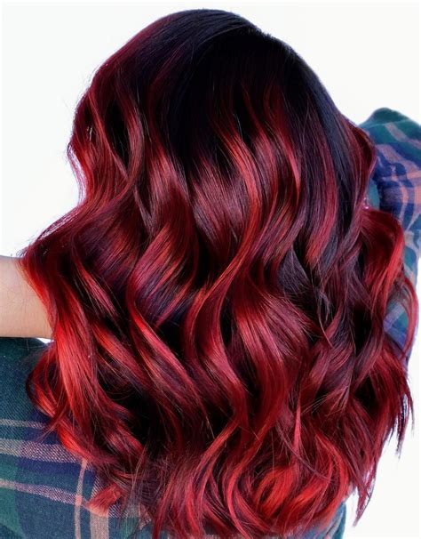 vibrant red balayage with bright ribbons of color from live love dohair red balayage hair red